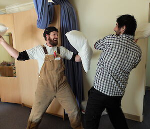 Expeditions in pillow fight to decide who gets the room