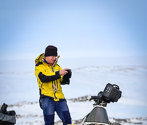 Technician checks camera gear