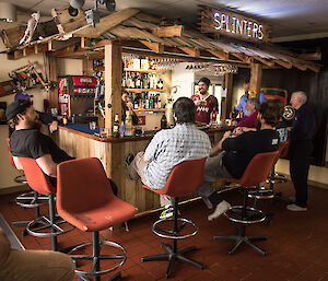 Expeditioners around the bar