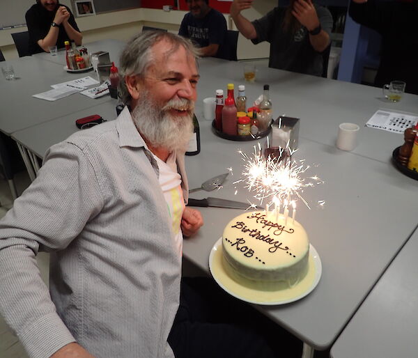 Expeditioner with birthday cake