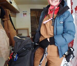 Station Doctor departs for hut visit dressed in full winter gear with large bag