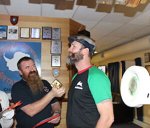 Expeditioner having beard judged stands confidently