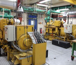 Inside the emergency powerhouse showing lots of pipes and machinery