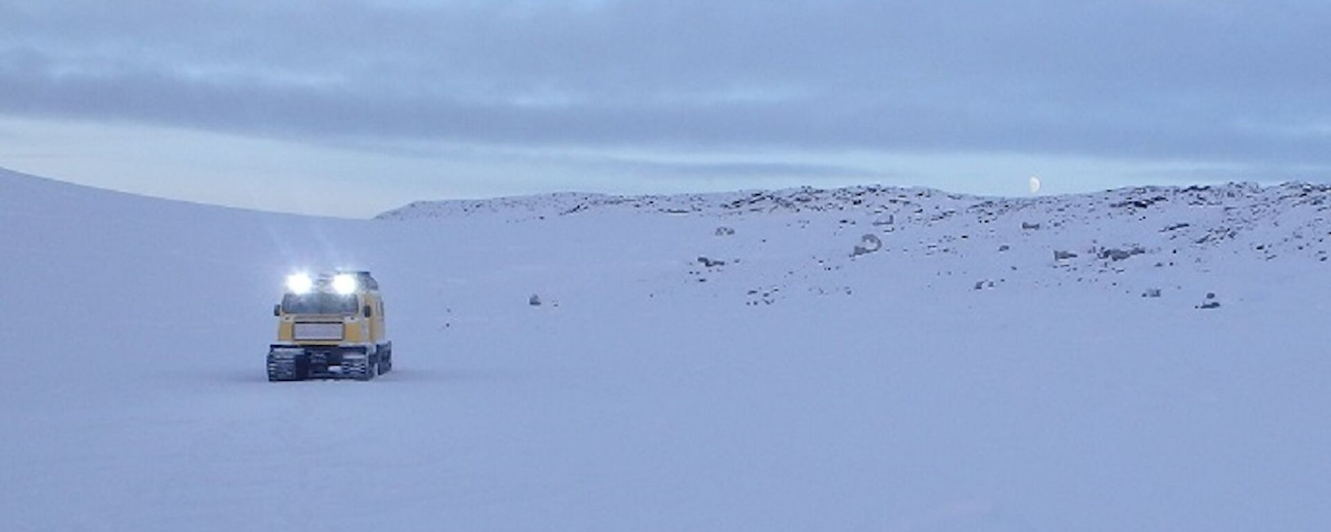 Oversnow vehicle on way to sampling site