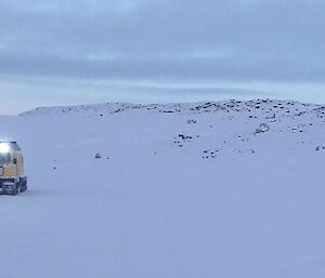 Oversnow vehicle on way to sampling site