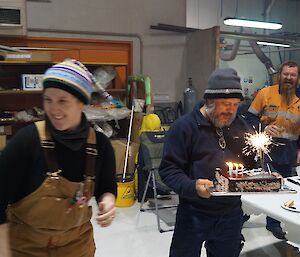 Expeditioner recieves his birthday cake.