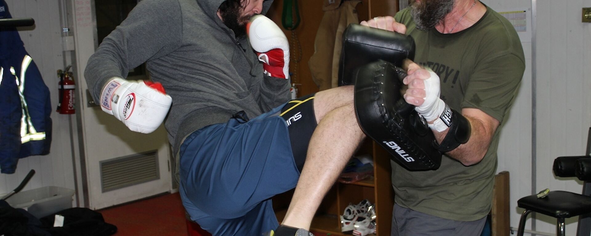 Expeditioner practising his kick-boxing moves in the gym