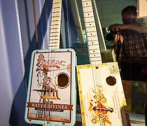 Two guitars made from cigar boxes