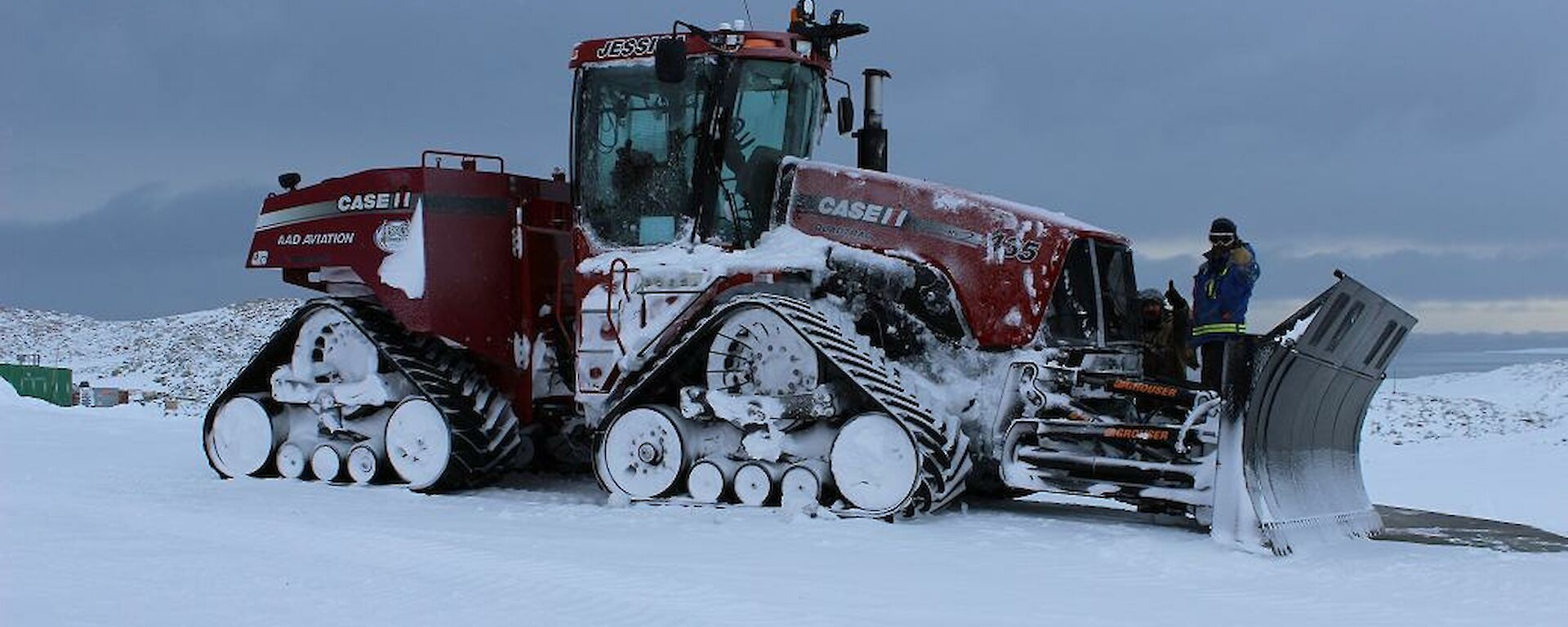 Expeditioners remove snow from truck