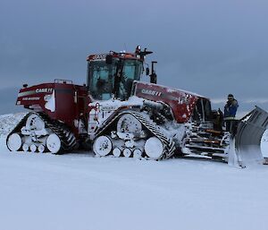 Expeditioners remove snow from truck