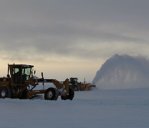 Machinery clearing the runway
