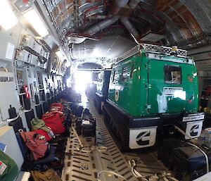 Inside the large cargo bay of the C-17 aircraft