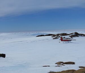 Twin Otter aircraft at a remote landing site near Snyder Rocks