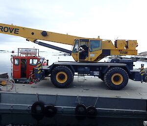 Driving the 60 tonne crane onto the barge for RTA