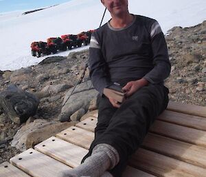 Expeditioner enjoying time at a hut