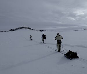 Expeditioners skiing