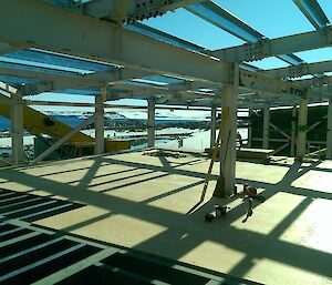 A building is being constructed and Antarctic scenery is viewable through it