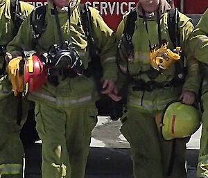 Jimmy and Cameron at Fire training dressed in their turn out clothing and self-contained breathing apparatus.
