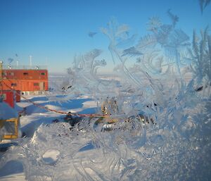 Frozen ice crystals on a window which make very pretty patterns.