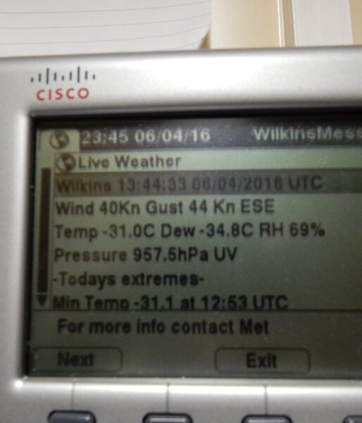 Photo of the weather display on the phone showing ambient outside temperature of −31° and wind speed at 44 kn.