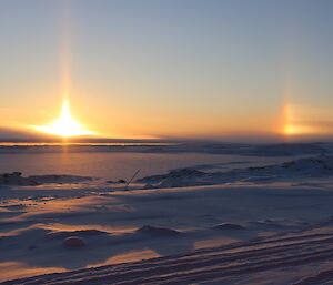 A sun dog on the horizon looking north from Casey.