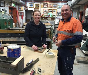 Danny and I standing next to the work bench in the trade’s workshop where I am working on my mid-winter memento.