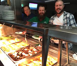 Dean, Adam & Tom getting lined up at the bain-marie to get their dinner.