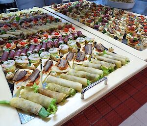 The finger food laid out on mirror boards ready for the team to enjoy.