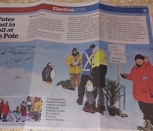 Photo of a news pare story done on voting in Antarctica with Shifty (penguin cut out) in line to vote.