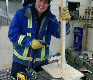 Expeditioner having some fun pretending to weld two pieces of wood together.