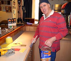 Andrew getting ready to stain the timber edge of the new bar top.