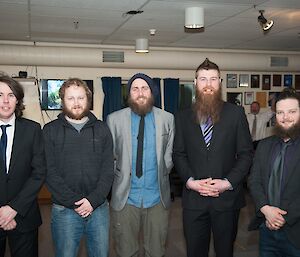 All five of the winter mechanics having a team photo at the end of winter dinner.