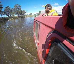 Hagglund training course as Sam looks on as we test its aquatic skills out for the first time.