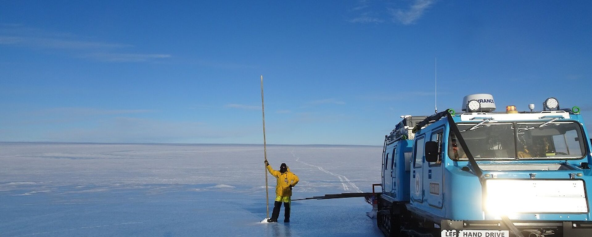 Kieran standing next the newly installed cane with the blue Hägg to the right.