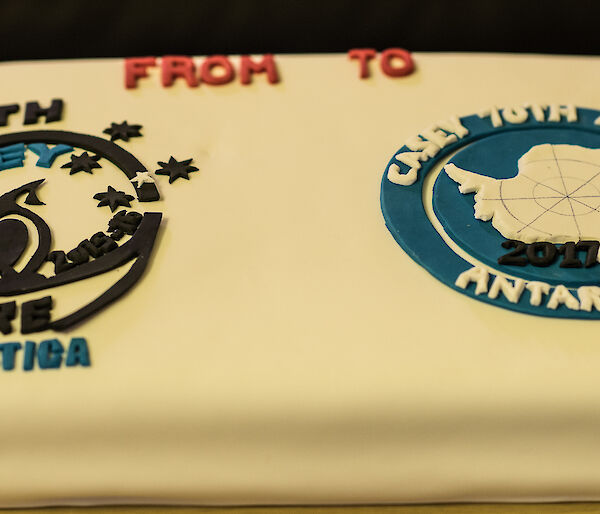 Cake depicting 69th & 70th ANARE logos