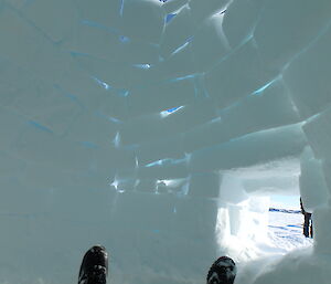 View from inside igloo showing light coming through the snow blocks