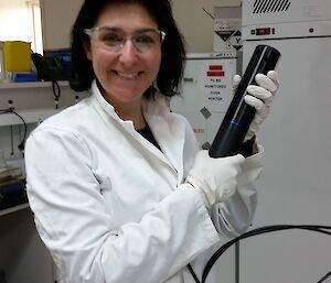 A scientist takes readings from a piece of equipment in the Casey laboratory