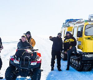 Expeditioners at Wilkes Station with a Hagg & quad bike