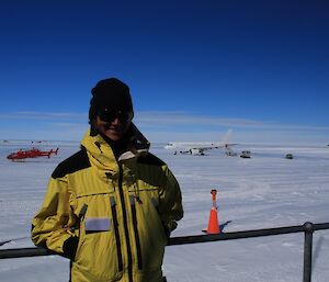 Jordan waits in front of aircraft at Wilkins airfield