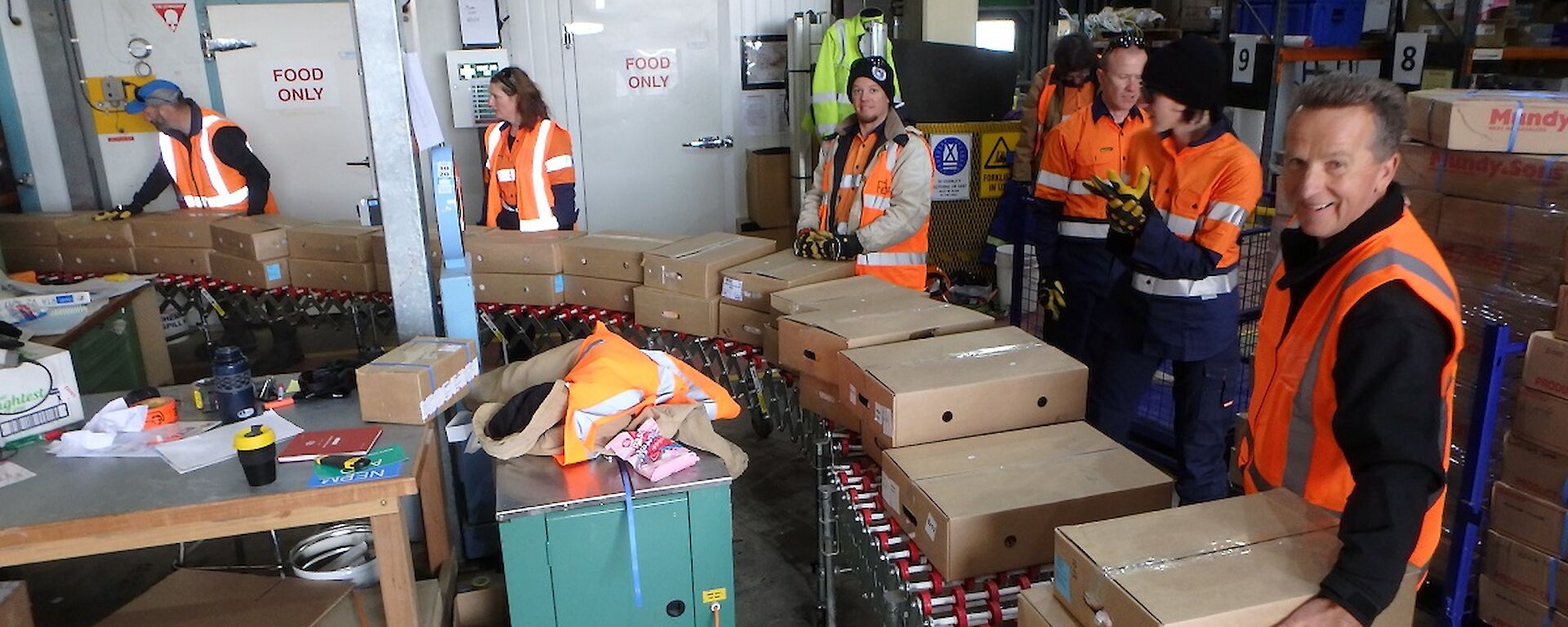 Australian Antarctic Division Director Nick Gales helps out in Casey store
