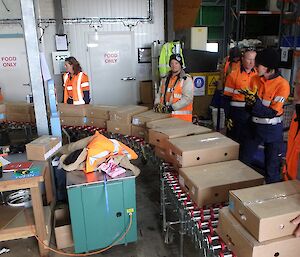 Australian Antarctic Division Director Nick Gales helps out in Casey store