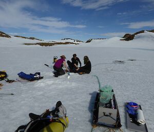 Expeditioners prepare the equipment to core the lake sediment
