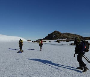 Expeditioners haul equipment on sleds during the field trip