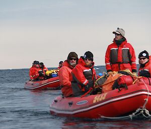 Tow boat loads of expeditioners cruise near Casey Station