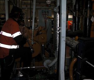 A Casey mechanic works on the generator rebuild