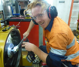 A Casey mechanic works on the generator rebuild