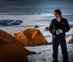 Casey Forecaster Jake camping on the Mitchell Peninsula near Casey Station