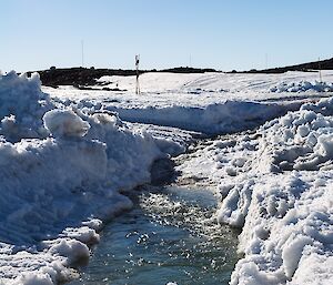 An image of melt water running to the ocean near Casey Station