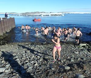 Expeditioners run from the cold water!