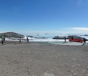 Expeditioners play cricket in the Australia Day sunshine at Casey